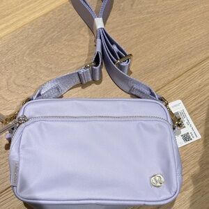 Lululemon Lavender Everywhere Crossbody Bag 2L with Gold Hardware